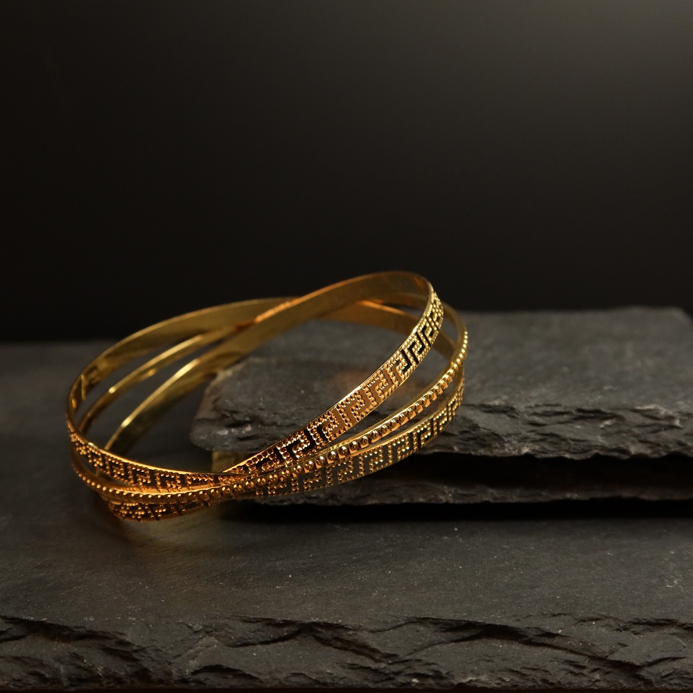Explore graceful 22ct gold bangle at PureJewels UK