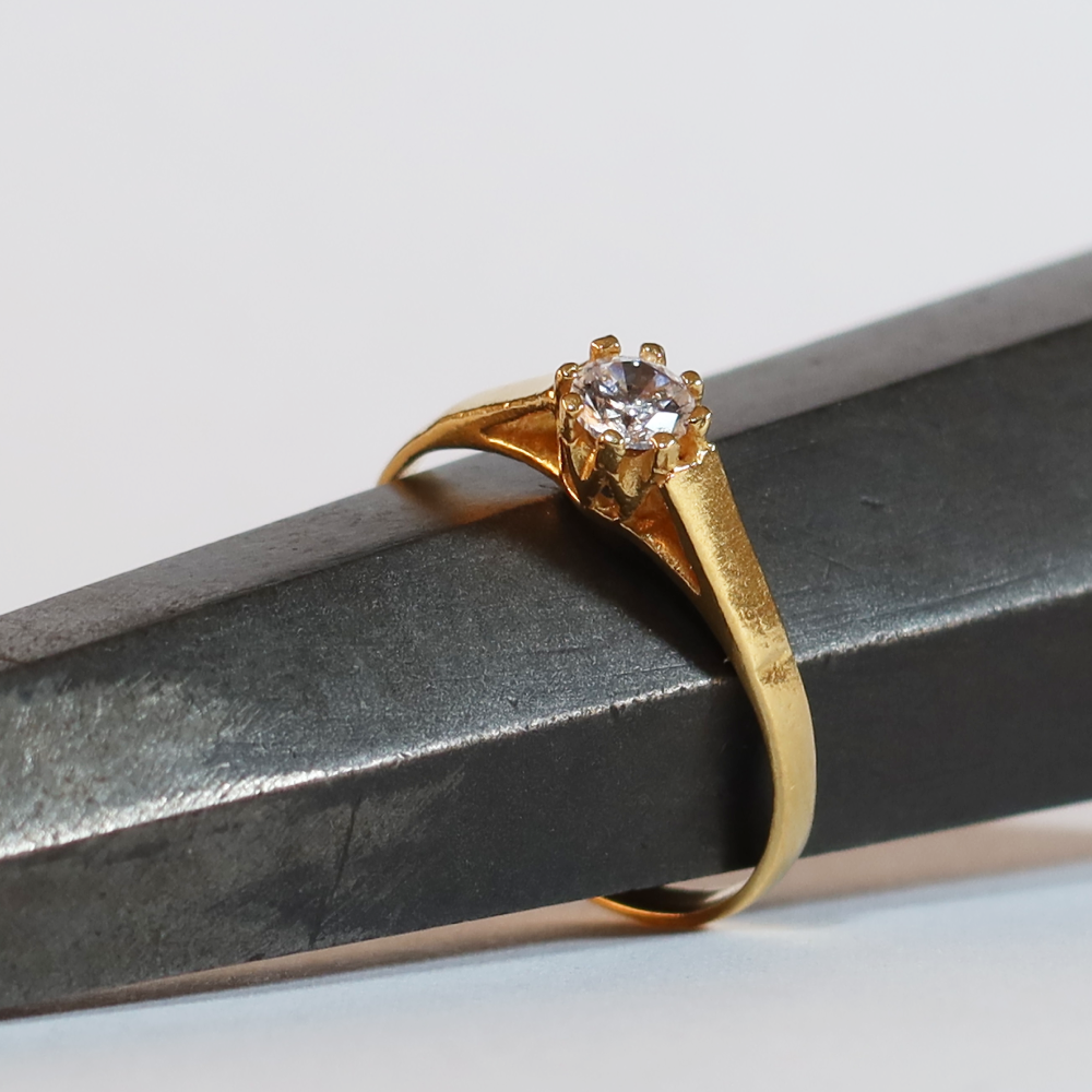 Diamond in 22 carat gold on sale